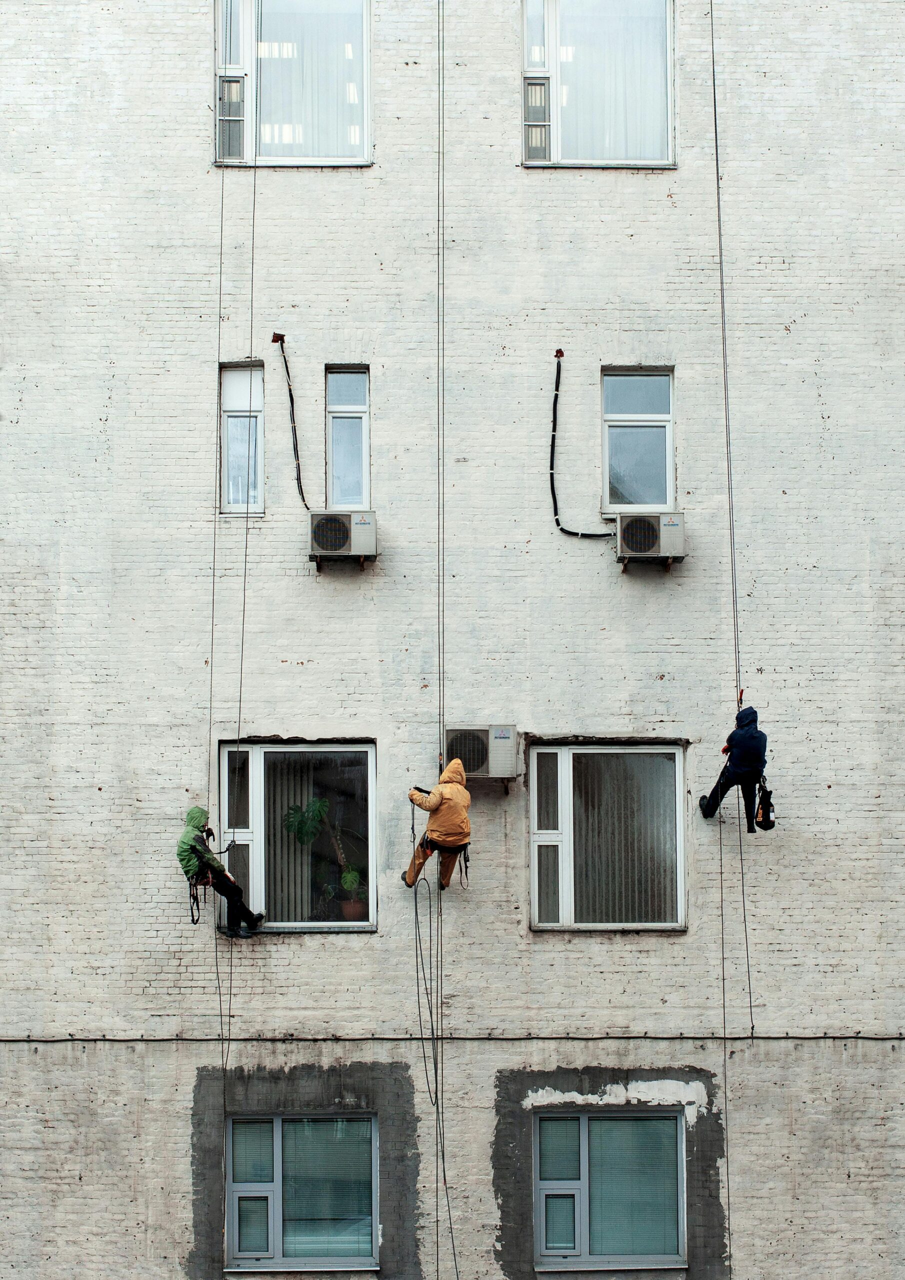 Experienced window cleaners working in Los Angeles, CA, providing clear, spotless windows for residential and commercial clients