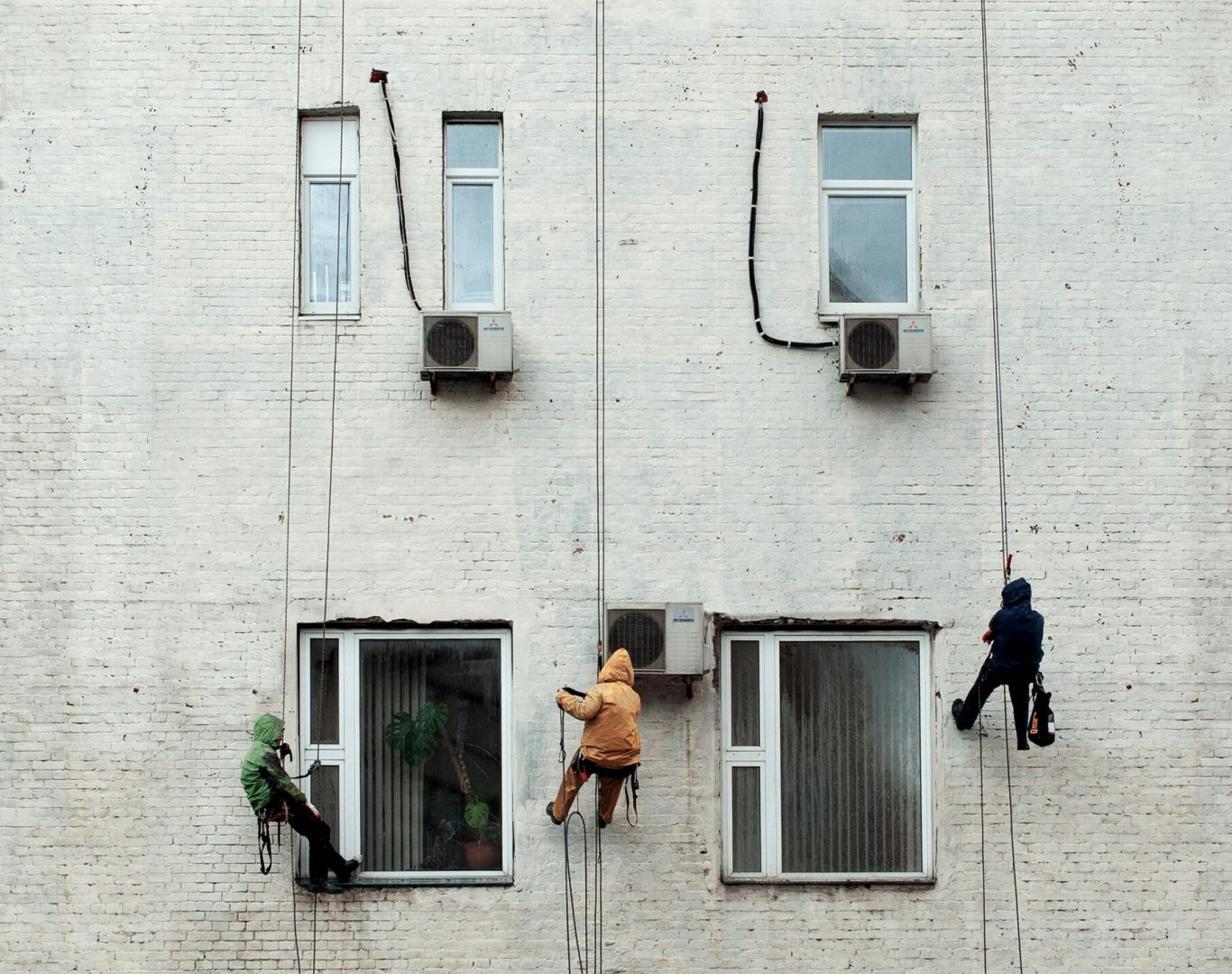 Experienced window cleaners working in Los Angeles, CA, providing clear, spotless windows for residential and commercial clients